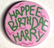 Deler - Bright Pink Tile, Round 2 x 2 with Bottom Stud Holder with Green 'HAPPEE BIRTHDAE HARRY', Dark Pink Swirls Pattern